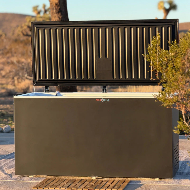 Black cold plunge with open lid and a wooden mat lifestyle image