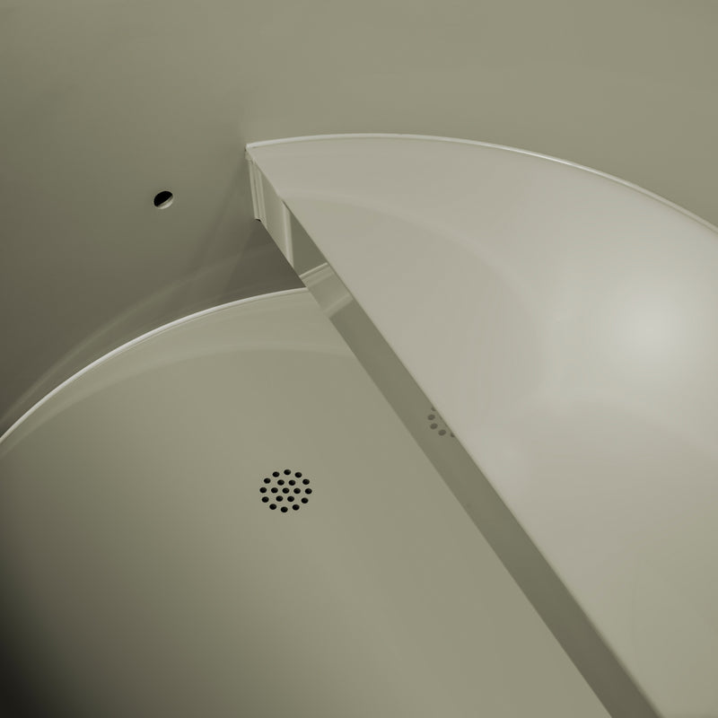 Corner of a shower enclosure with a drain cover