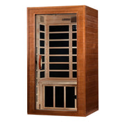 A single-person wooden infrared sauna with a warm brown wood exterior, glass door, and light wood interior with black thermal panels, shown on a plain white background.