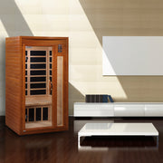 Wooden sauna in a modern living room with a white cabinet and coffee table.