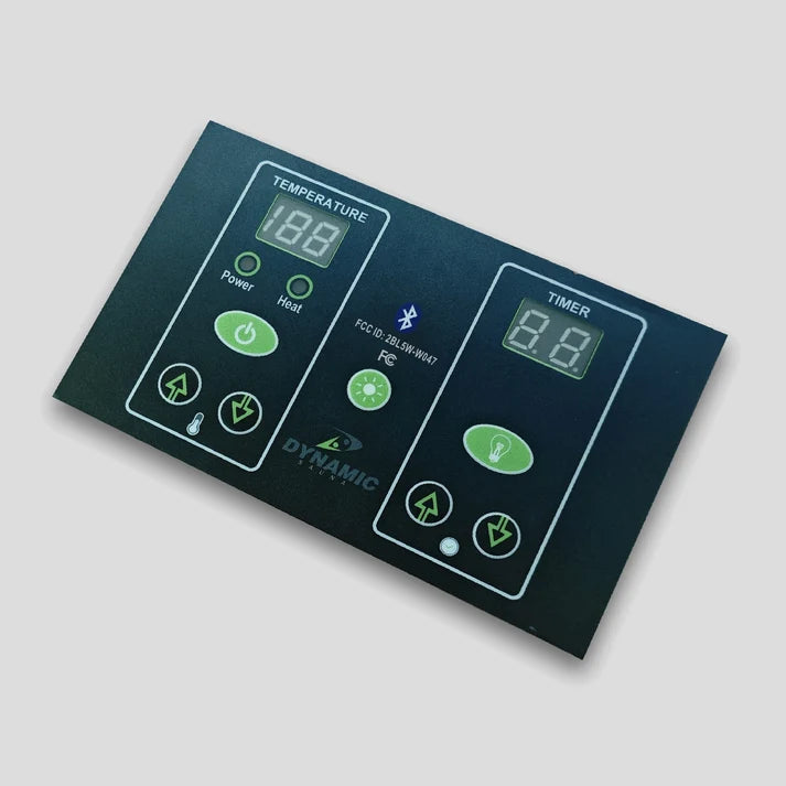 Control panel with digital display and buttons on a gray background