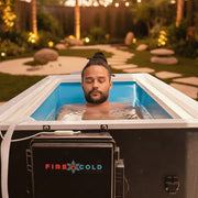 Person in a cold water cold plunge tub.
