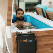 Person in a cold water cold plunge tub.